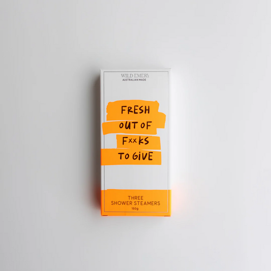 AN orange box containing a trio of ild Emery shower steamers. Caption reads: Fresh out of f**Ks to give!