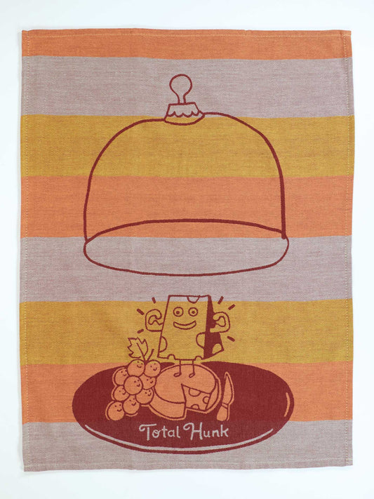 Striped towel with cartoon character and text on a white background