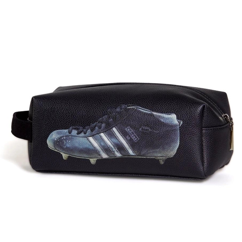 Black toiletry bag with a graphic of a blue soccer cleat on a white background