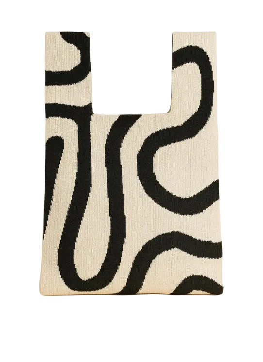 Beige tote bag with black wavy pattern on a white background