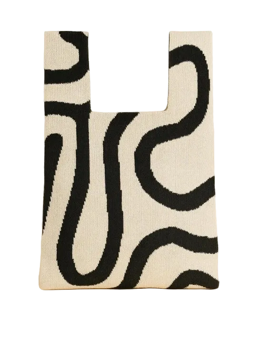 Beige tote bag with black wavy pattern on a white background