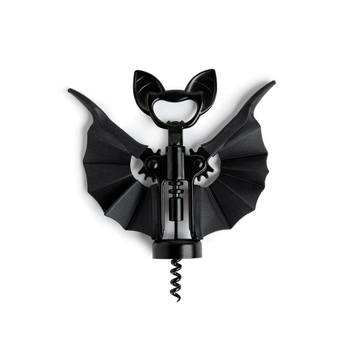 A bat shaped corkscrew and bottle opener with extended arms on a white background