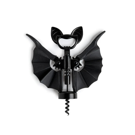 A bat shaped corkscrew and bottle opener with extended arms on a white background