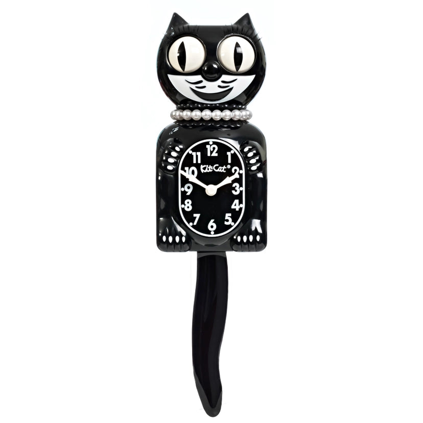 Black cat-shaped clock with white face on a white background