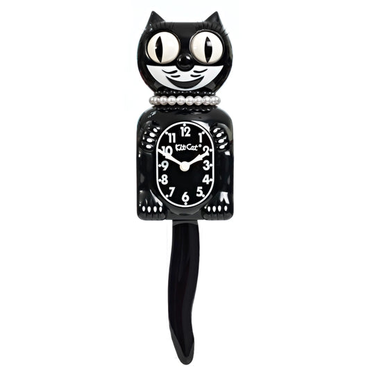 Black cat-shaped clock with white face on a white background