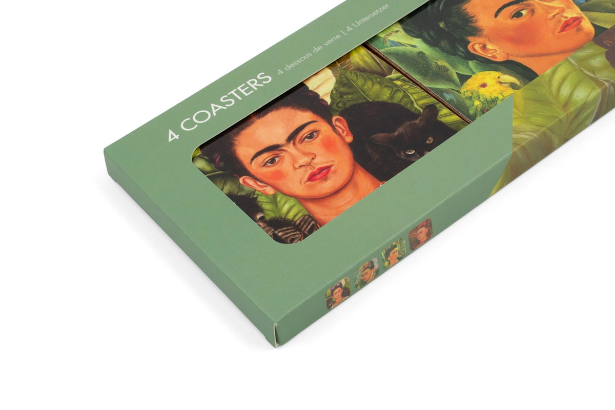 A  green box of 4 coasters of artist, Frida Kahlo placed on a diagonal. The background is white.