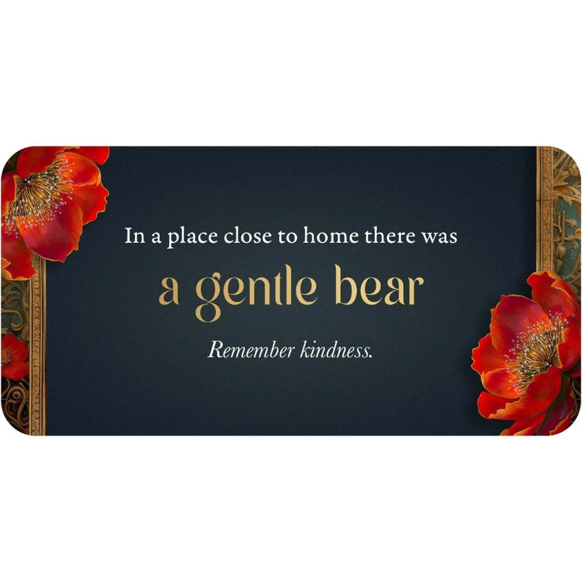 A navy affirmation card with text and two red flowers printed on the corners.