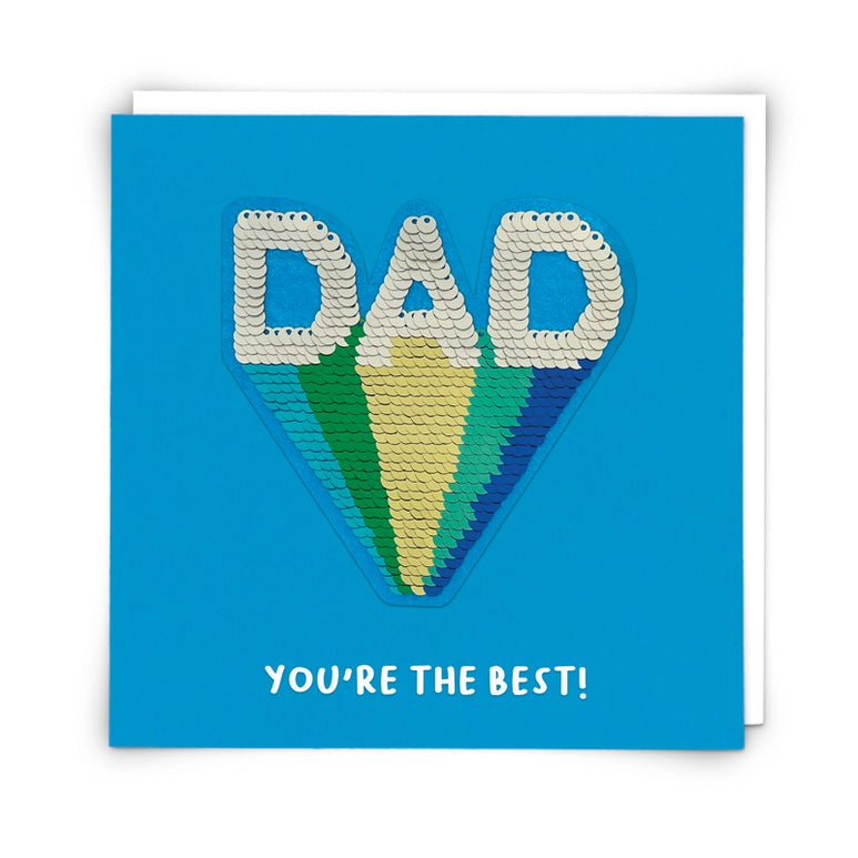 A blue greeting card featuring a sequined removable patch with text: Dad, you're the best on a white ackground.