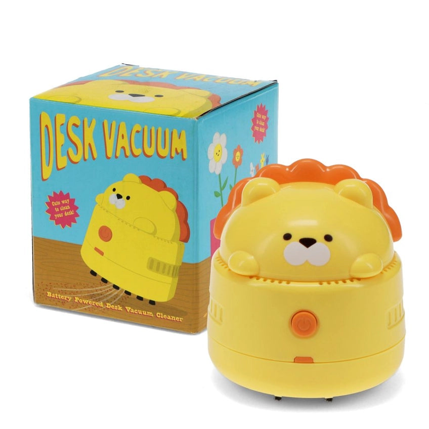 Yellow lion-shaped desk vacuum with packaging on a white background