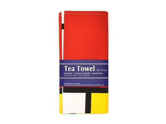 Red tea towel with a colorful label on a white background