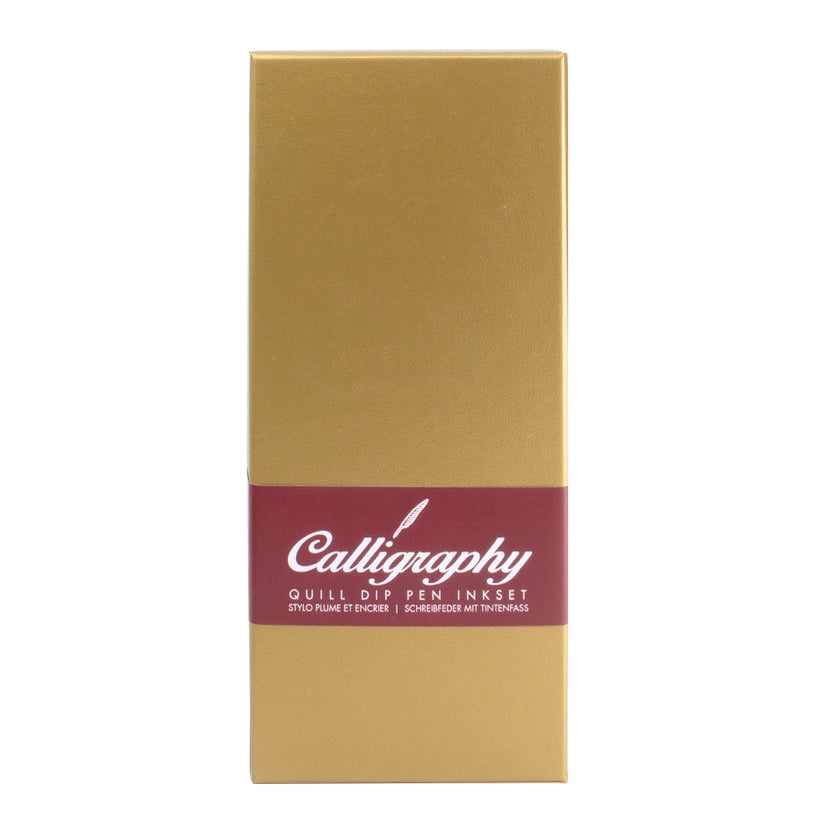 A gold gift box and a burgundy paper band with the text: Calligraphy quill dip pen ink set. The background is white.