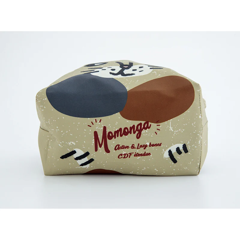 Hexagonal container with cartoon design and 'Momonga' branding on a white background