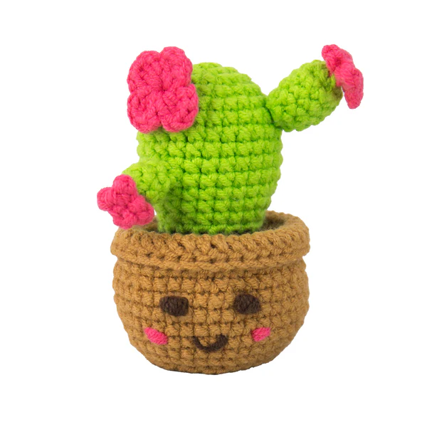 Crocheted cactus plant with pink flowers in a brown pot on a white background