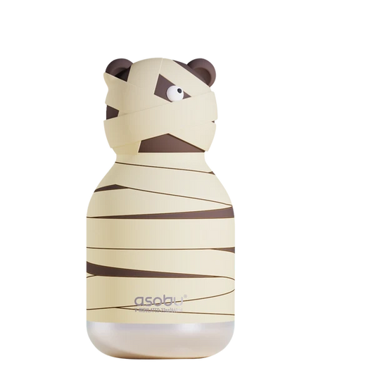 A brown bear shaped drink bottle wrapped in bandages on a white background