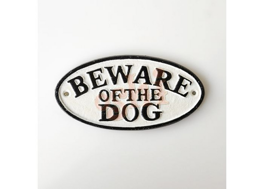 Decorative sign with 'Beware of the Dog' text on a white background