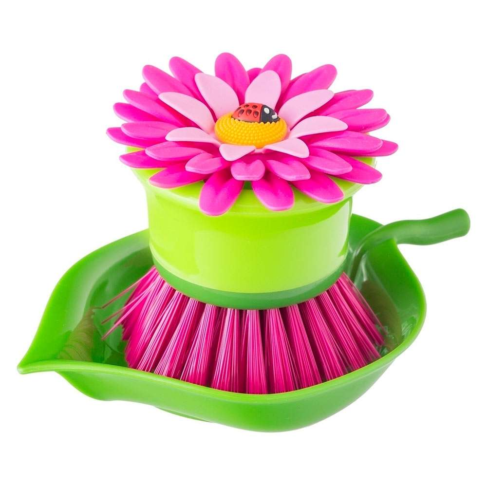 Toy brush with pink bristles and a flower-shaped handle on a white background