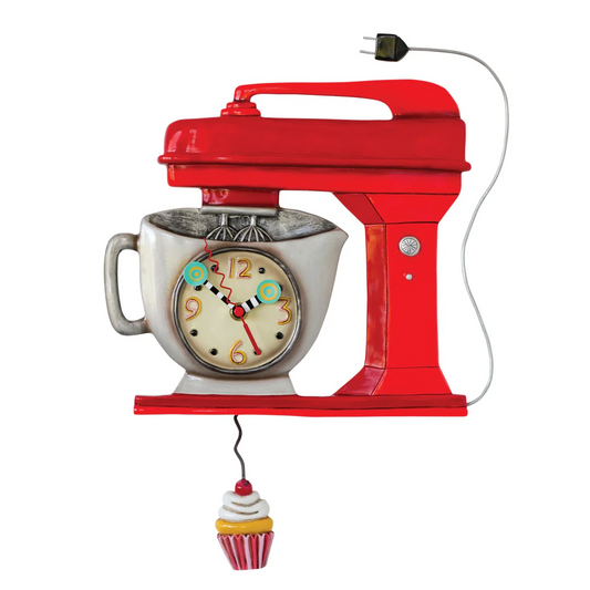 Red mixer clock with a cupcake pendulum on a white background