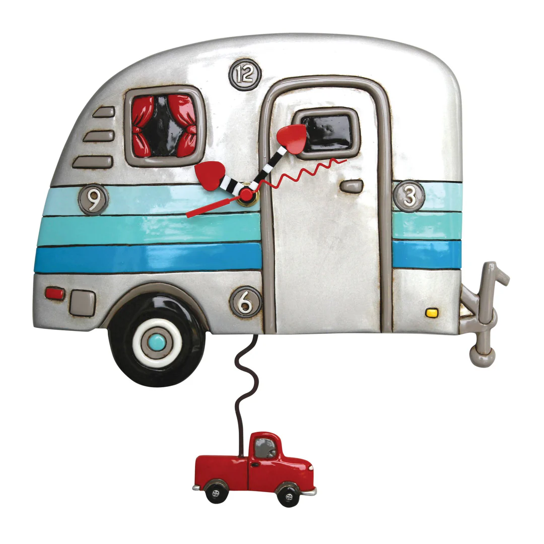 Decorative clock shaped like a camper with a red truck pendulum on a white background