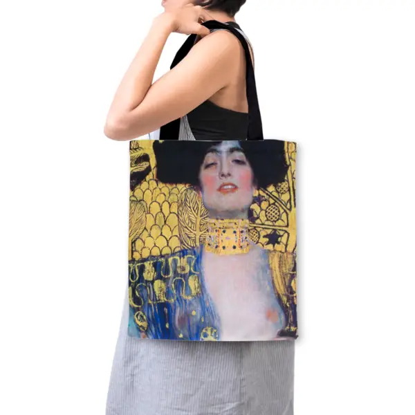 Tote bag with artistic design of a woman's portrait on a white background