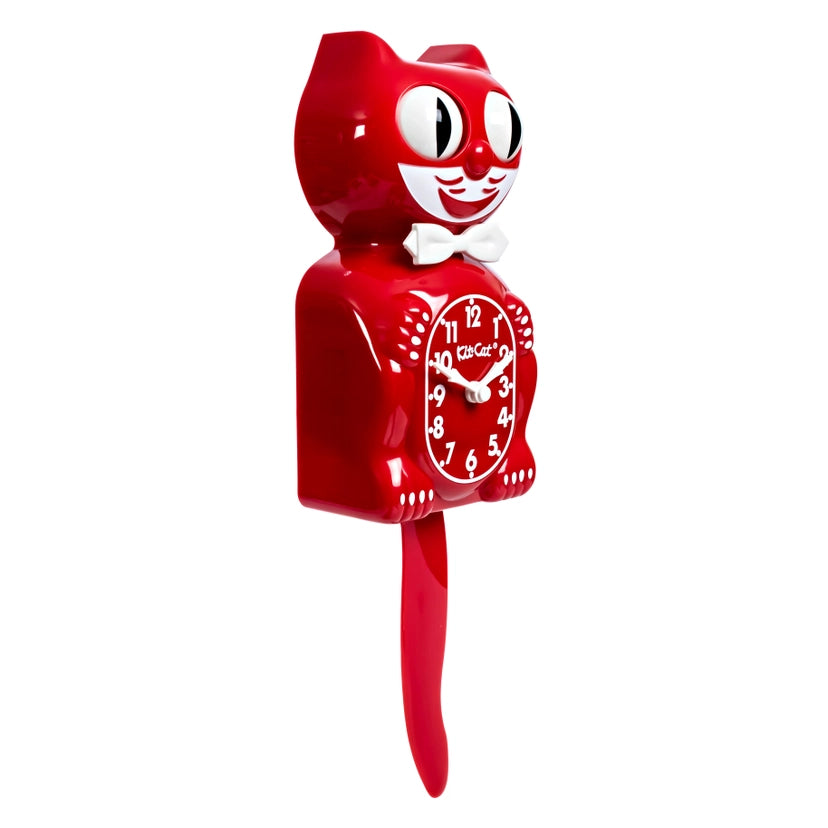 Red cat-shaped clock with a smiling face on a white background