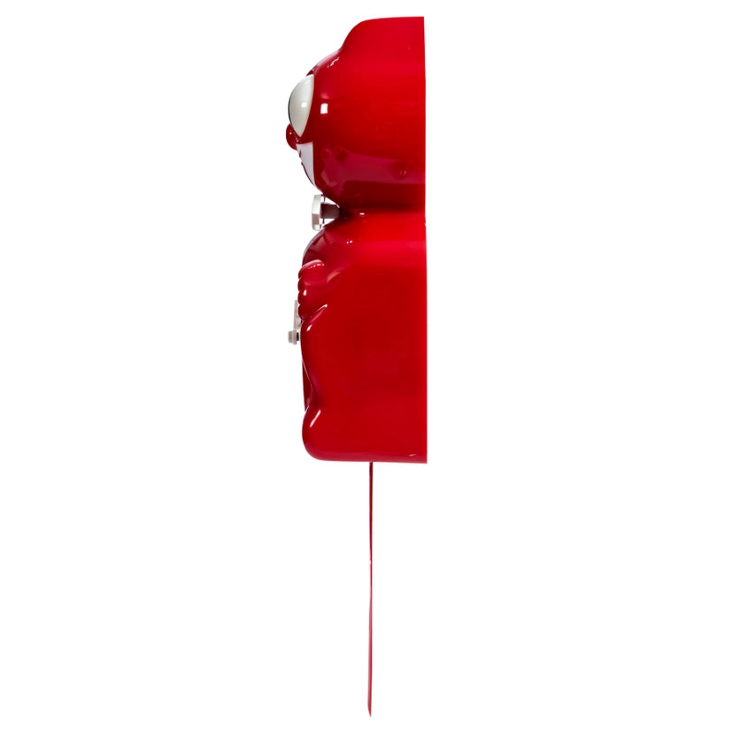 Red wall-mounted clock on a white background