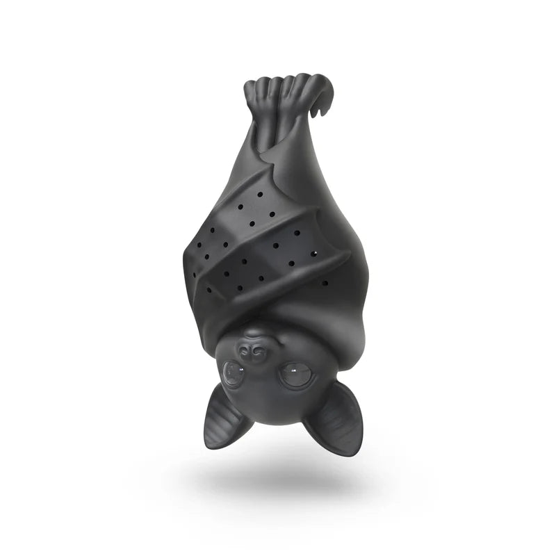 A black hanging bat tea infuser on a white background