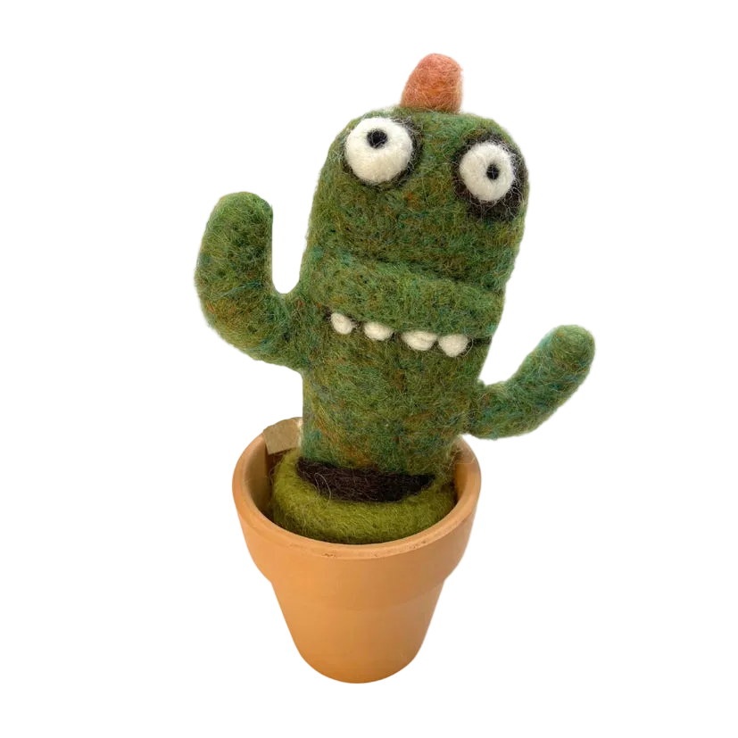 A crazy looking green wool Saguaro felt decoration in a terracotta pot. The background is white.