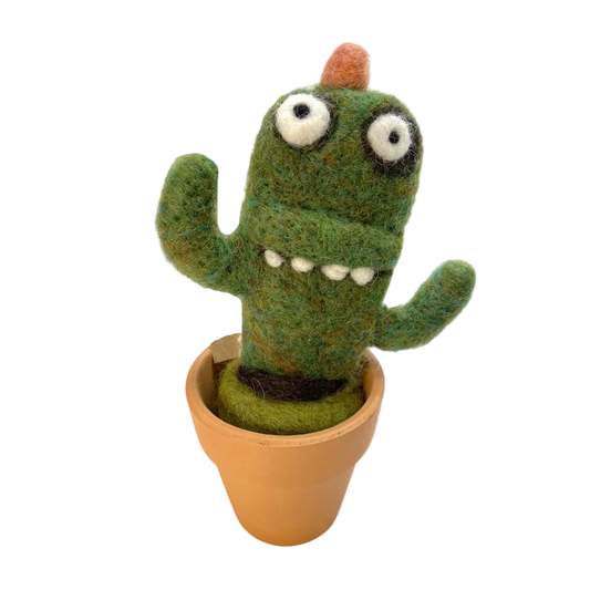 A crazy looking green wool Saguaro felt decoration in a terracotta pot. The background is white.