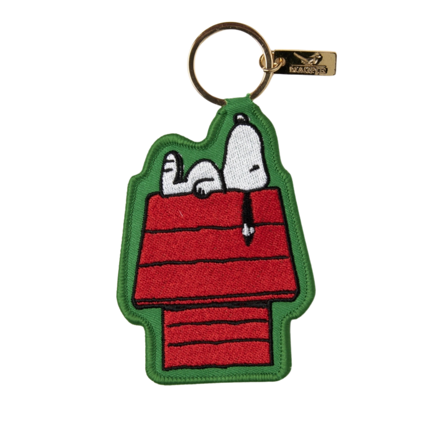 Keychain with Snoopy and Woodstock on a doghouse design against a white background