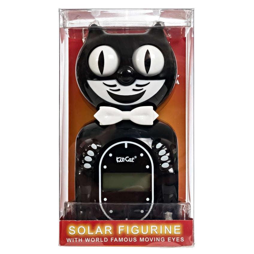 Black cat-shaped solar figurine with moving eyes in packaging