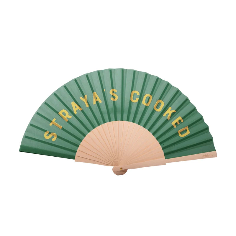 A green fan with text that states: Straya's Coked on a white background