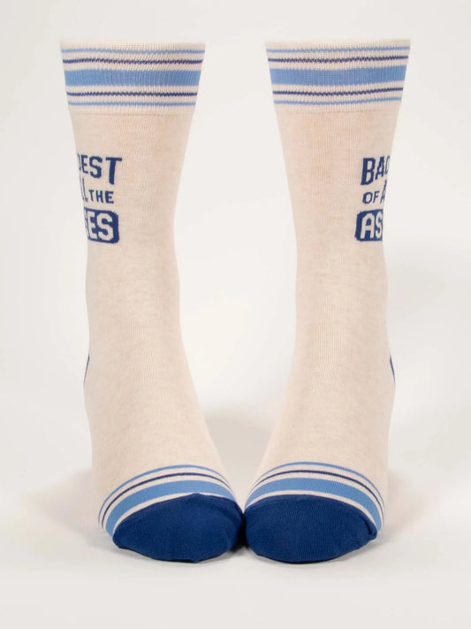 Blue Q men's crew socks. White with blue stripes and featuring a slogan on the side leg stating "Baddest of all asses"