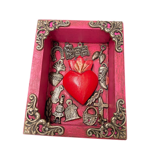 Mexican pink  frame with enclosed heart and milagros (10x8cm)