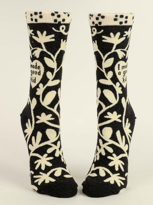 Front view floral white and black women's crew socks on a white background.